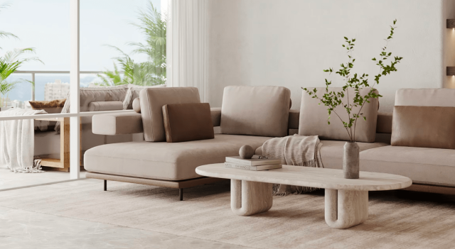 Stylish beige couch in a serviced apartment